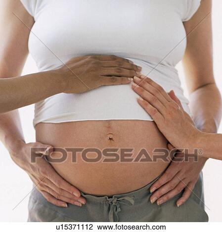 Stock Image - Pregnant woman. Fotosearch