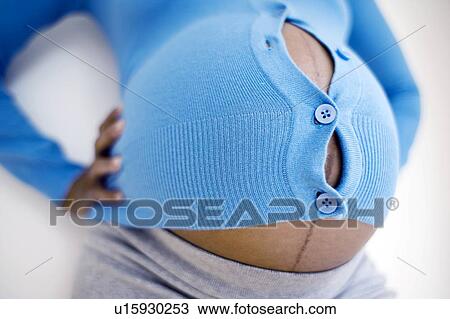 Stock Image - Pregnant woman. Fotosearch