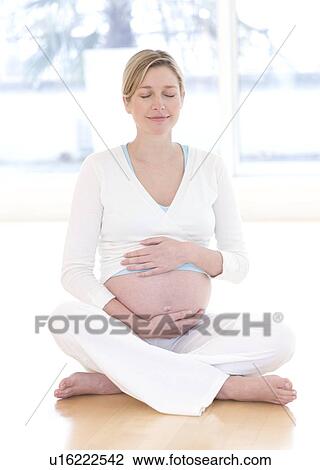 Stock Image - Pregnant woman. Fotosearch