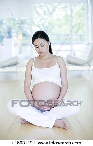 Stock Image - Pregnant woman. Fotosearch