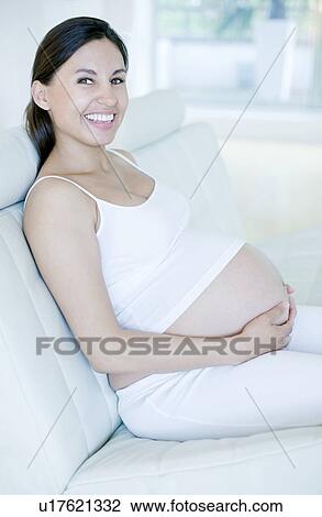 Stock Image - Pregnant woman. Fotosearch