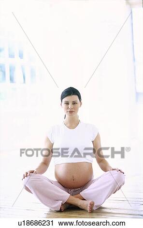 Stock Image - Pregnant woman. Fotosearch