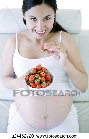 Stock Image - Pregnant woman. Fotosearch