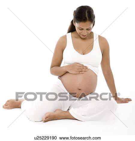 Stock Image - Pregnant woman. Fotosearch