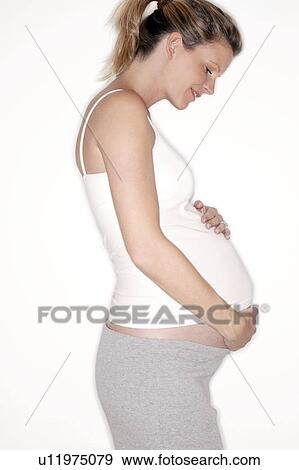 Stock Photo - Pregnant woman. Fotosearch