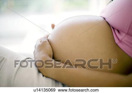 Pregnant woman View Large Photo Image Stock Photo - Pregnant woman. Fotosearch