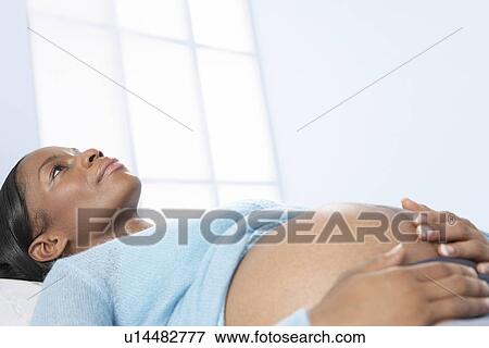 Stock Photo - Pregnant woman. Fotosearch
