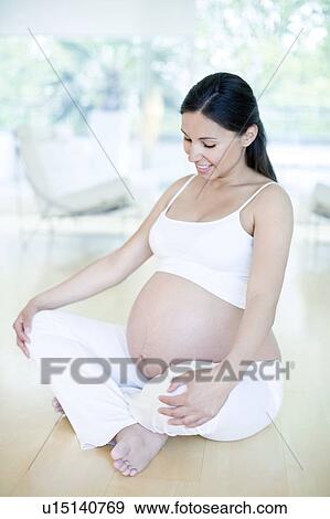 Stock Photo - Pregnant woman. Fotosearch