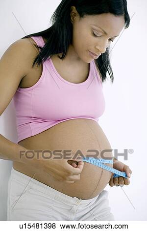 Pregnant woman View Large Photo Image Stock Photo - Pregnant woman. Fotosearch