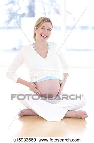 Stock Photo - Pregnant woman. Fotosearch