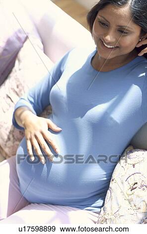 Stock Photo - Pregnant woman. Fotosearch
