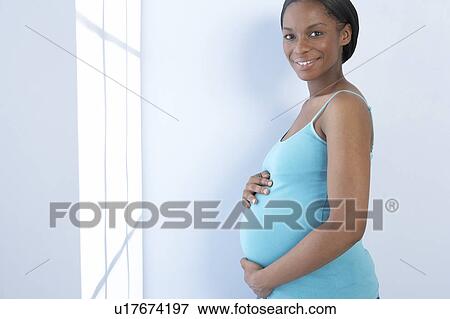 Stock Photo - Pregnant woman. Fotosearch