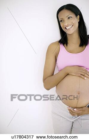 Stock Photo - Pregnant woman. Fotosearch