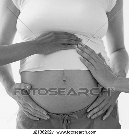 Stock Photo - Pregnant woman. Fotosearch