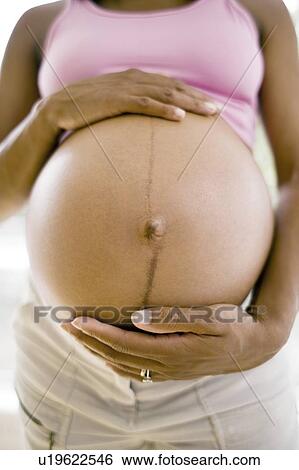 Pregnant woman View Large Photo Image Stock Photograph - Pregnant woman. Fotosearch