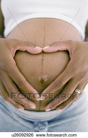 Stock Photograph - Pregnant woman. Fotosearch