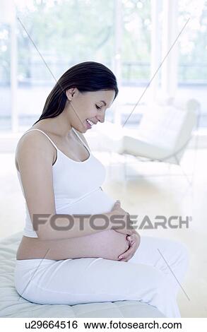 Stock Photograph - Pregnant woman. Fotosearch