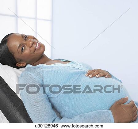 Stock Photograph - Pregnant woman. Fotosearch