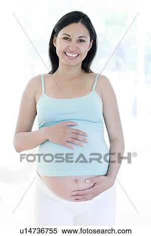 Stock Photography - Pregnant woman. Fotosearch