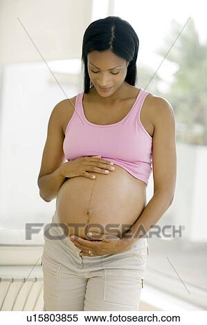 Stock Photography - Pregnant woman. Fotosearch