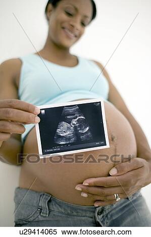 Stock Photography - Pregnant woman. Fotosearch
