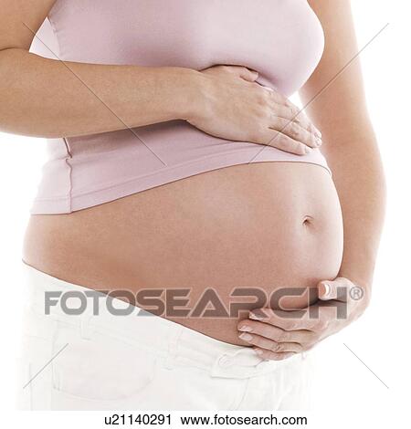Pregnant woman's abdomen View Large Photo Image Stock Image - Pregnant woman's abdomen. Fotosearch