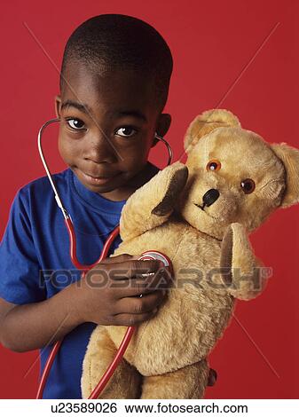 Pretend examination View Large Photo Image Stock Photograph - Pretend examination. Fotosearch