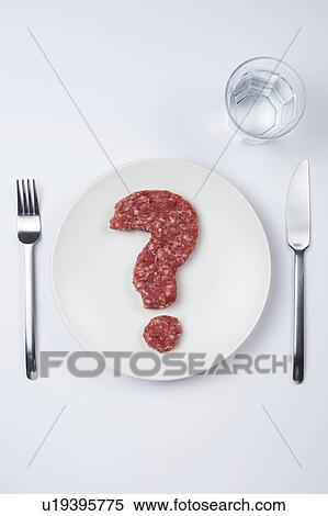Stock Photography - Red meat in the shape of question mark. Fotosearch