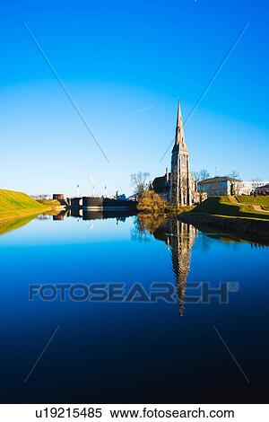 River reflection of church spire and blue sky, Copenhagen, Denmark View Large Photo Image Stock Photography - River reflection of church spire and blue sky, Copenhagen, Denmark. Fotosearch
