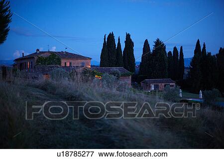 Row of houses on hillside, Buonconvento, Tuscany, Italy View Large Photo Image Stock Photo - Row of houses on hillside, Buonconvento, Tuscany, Italy. Fotosearch