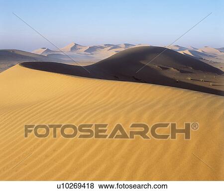 Sand dunes View Large Photo Image Stock Photo - Sand dunes. Fotosearch