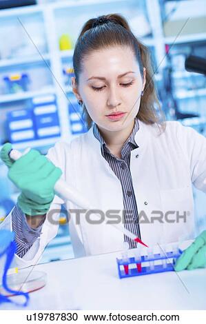 Scientist using pipette View Large Photo Image Stock Image - Scientist using pipette. Fotosearch