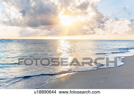 Picture - Seascape and beach at sunset, Dominican Republic, The Caribbean. Fotosearch