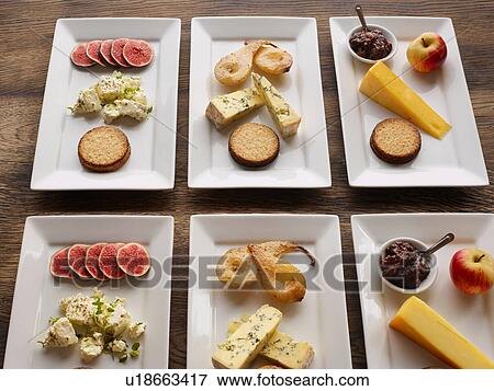 Selection of cheeseboards View Large Photo Image Stock Photo - Selection of cheeseboards. Fotosearch