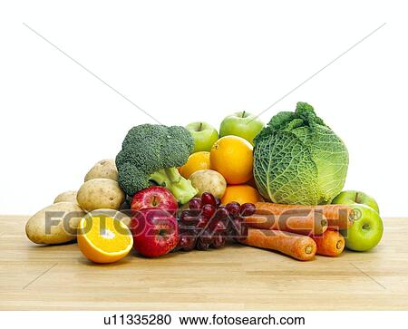 Stock Image - Selection of fresh fruit and vegetables. Fotosearch