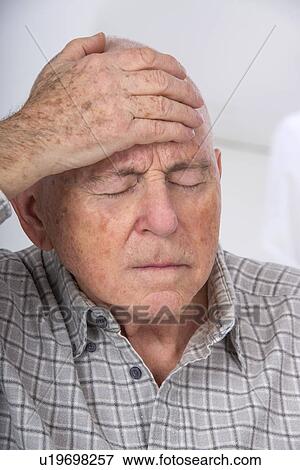 Stock Photo - Senior man with headache. Fotosearch