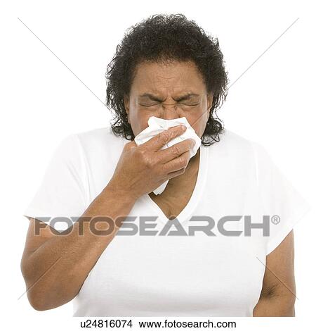 Senior woman sneezing View Large Photo Image Picture - Senior woman sneezing. Fotosearch