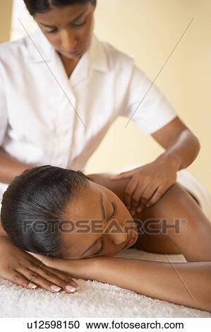 Stock Image - Shoulder massage. Fotosearch