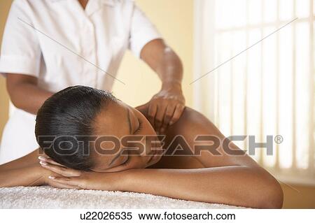 Stock Photography - Shoulder massage. Fotosearch