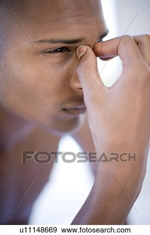 Stock Photo - Sinus pain. Fotosearch