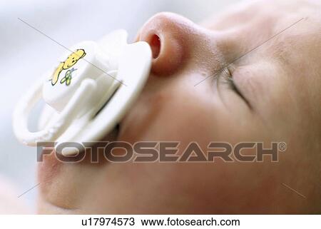 Stock Image - Sleeping baby boy. Fotosearch