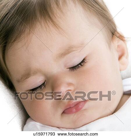 Stock Image - Sleeping baby girl. Fotosearch