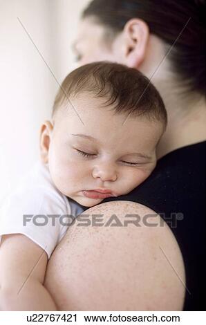 Stock Image - Sleeping baby girl. Fotosearch