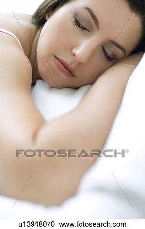 Stock Image - Sleeping woman. Fotosearch