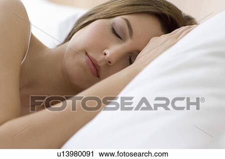 Stock Image - Sleeping woman. Fotosearch