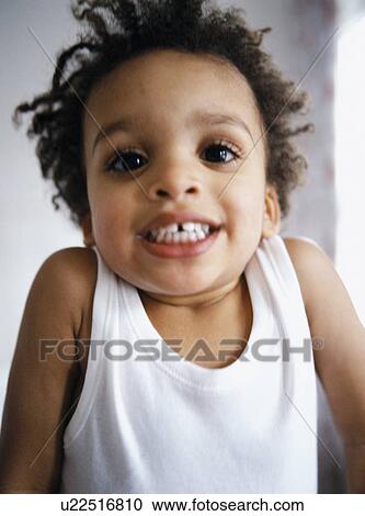 Stock Image - Smiling boy. Fotosearch