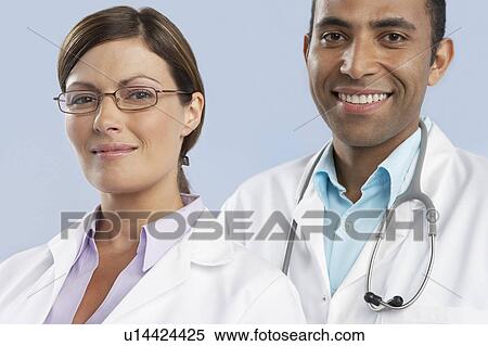 Stock Photography - Smiling doctors. Fotosearch