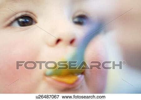 Spoon-feeding View Large Photo Image Stock Photo - Spoon-feeding. Fotosearch