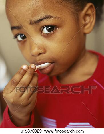 Stock Photo - Spoonful of medicine. Fotosearch