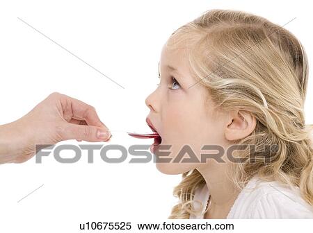 Stock Photography - Spoonful of medicine. Fotosearch